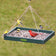 Duncraft XL Hanging Platform Bird Feeder with Northern Cardinal, American Goldfinches, and Chickadee, featuring a seed tray and durable green frame with metal chains.