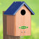 Duncraft Bluebird Post-Tree Mount House with blue roof, slotted ventilation, and 1-1/2 inch entry hole, made from durable recycled plastic.