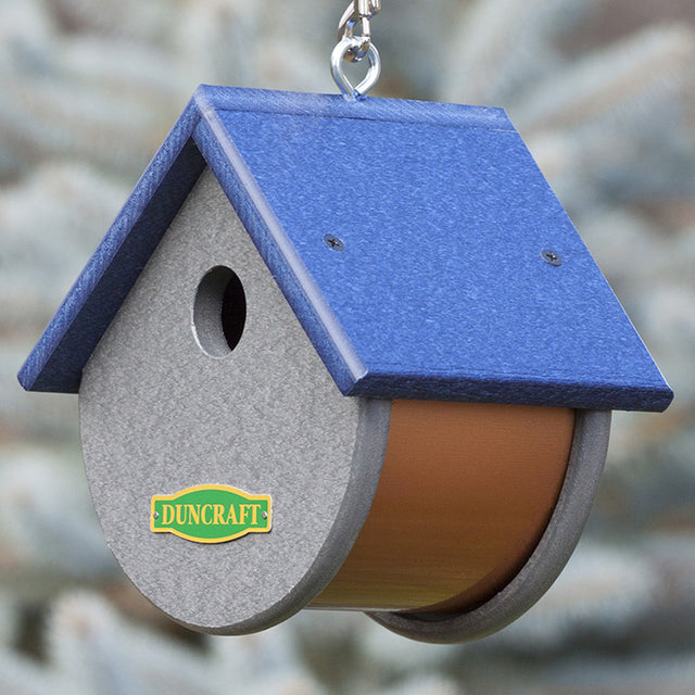 Teardrop Chickadee House with blue roof, made from recycled plastic, featuring a 1-1/4 inch entry hole and hanging chain for easy installation.