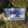 Duncraft Window Breeze Blocker Feeder with birds feeding, features strong suction cups, wind-resistant sides, and a clear plastic tray for easy viewing and refilling.