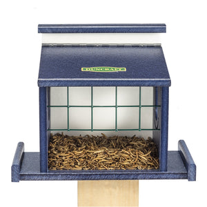 Duncraft Bluebird Diner Haven featuring a blue roof, enclosed feeding area, and mealworm capacity, with oval fly-through openings for easy bird access.