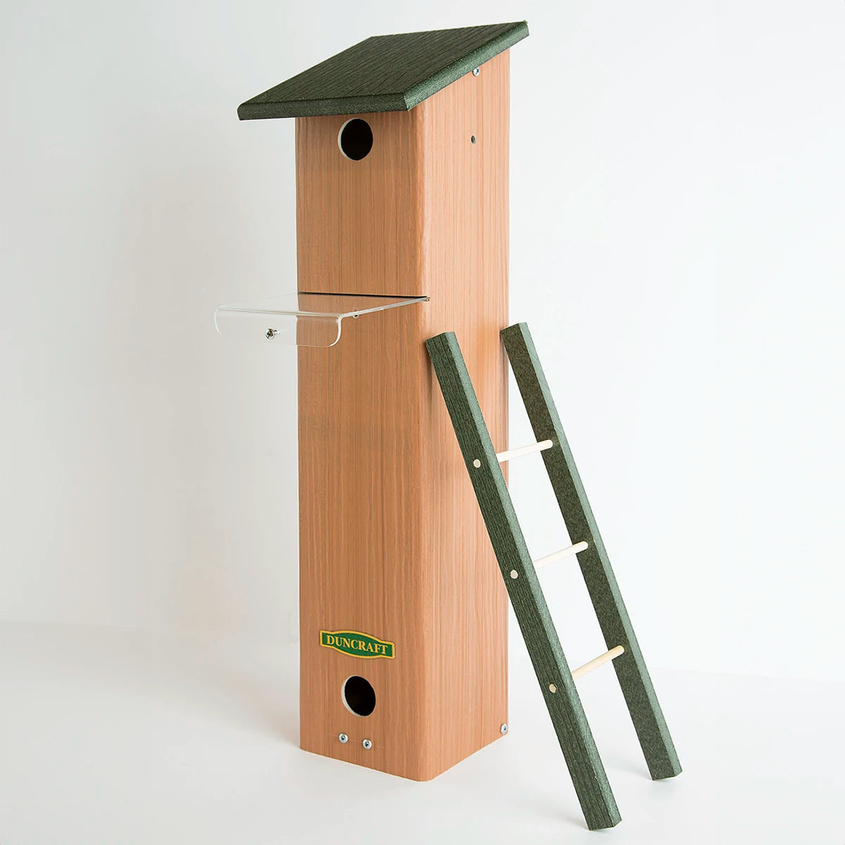 Duncraft Songbird House and Roosting Box, featuring a wooden structure with a built-in ladder and two entry holes for nesting and roosting.