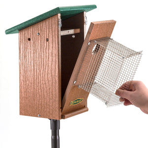 Hand holding Duncraft Bird-Safe® Bluebird House & Pole with Noel Guard, showcasing wire mesh and wood grain details for predator protection and easy assembly.