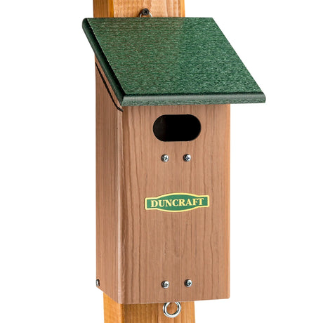 Duncraft Bird-Safe® Swallow House features a green roof, oval entrance, grooved perch, and easy mounting tab. Designed to attract Tree Swallows and deter House Sparrows.