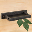 Barn Swallow & Phoebe Nesting Shelf, a black recycled plastic platform with a green leaf, designed for safe and durable bird nesting. Includes mounting hardware.