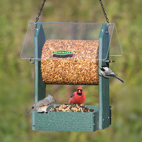 Duncraft Sheltered Log Platform Feeder with birds eating seeds, featuring a sturdy hanging chain and clearview plastic roof.