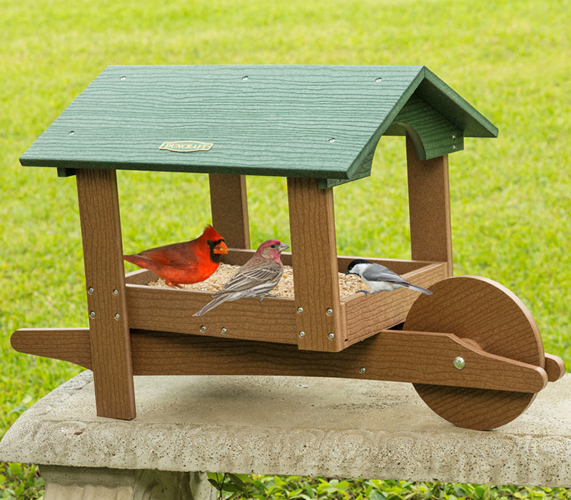 Duncraft Covered Garden Cart Platform Feeder with birds perching, featuring a roof, durable design, and metal mesh drainage for year-round feeding.