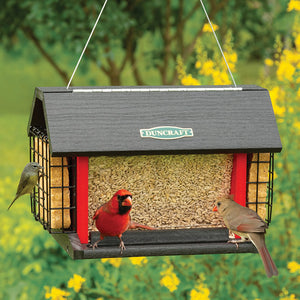 Red Barn Cardinal Feeder with birds perched and feeding from all four sides, featuring seed trays, suet holders, and a protective hopper for year-round use.