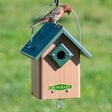 Duncraft Hide-A-Key Bird House with a green roof, featuring a small bird perched on it and a 1-1/8 inch entry hole.