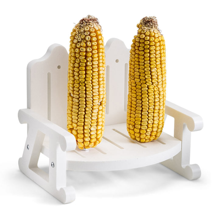 Squirrel's Corn-On-The-Cob Bench with two skewered corn ears for feeding squirrels, featuring a bench-style platform made from white recycled plastic.