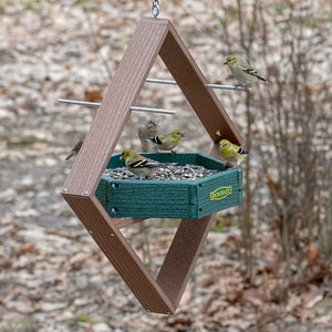 Duncraft Hexagon Hanging Twirl Platform Feeder with birds on metal perches and seed tray, featuring mesh drainage and recycled material.