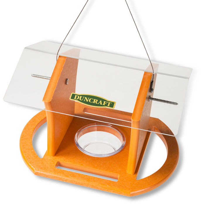 Duncraft Oriole Fruit & Jelly Cafe Feeder with clear glass container, four perches, and a durable plastic roof, designed for feeding orioles with oranges and jelly.