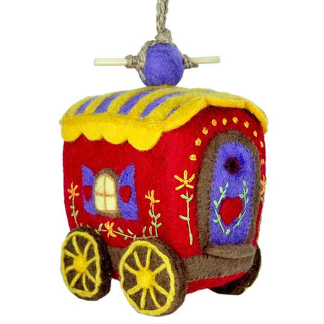 Woolie Gypsy Wagon Bird House with a colorful design, featuring a felt structure, jute hanging cord, and bamboo perch, perfect for small birds.