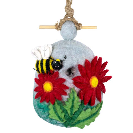 Woolie Bumblebee Bird House made of water-resistant wool, featuring a small entrance, bamboo perch, and jute hanging cord. Ideal for small birds.