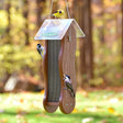 Duncraft Wave Mesh Nyjer® Feeder with birds feeding, featuring clinging mesh sides and a clear plastic roof for ample feeding space.