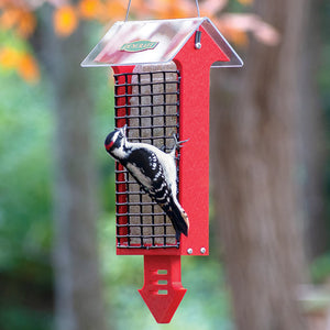 Duncraft Red Arrow Tail Prop Double Suet Feeder with a woodpecker clinging to the wire grid, feeding from one of the two suet cakes.