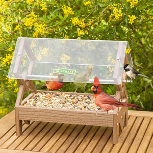 Duncraft Double Diamond Platform Feeder showing multiple birds feeding on a clearview plastic roof with aluminum perches and an easy-clean seed tray.