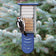 Duncraft Bird-Safe® Tail Prop Double Suet Feeder with wire grid, extended tail prop, and recycled plastic, holds two suet cakes. Woodpecker foraging on feeder.