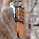 Woodpecker on Tail Prop Suet Feeder, Cedar, pecking at suet in black wire cage, with tail support for balance. Ideal for attracting woodpeckers.