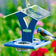 Duncraft Easy Bluebird Feeder with two clear cups on a blue platform, features a protective roof, attracting bluebirds with mealworms or suet pellets.