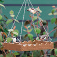 Duncraft Wave Platform Feeder with birds perched on rippled walls, featuring an S-hook hanging chain and metal mesh drainage.