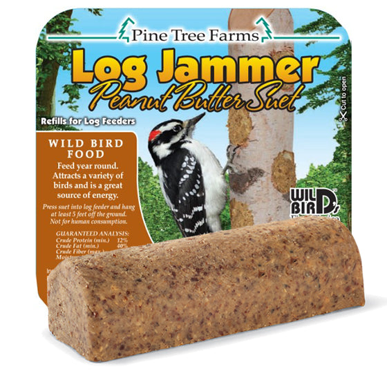 Log Jammer Peanut, 12 Suet Plugs displayed on a tree trunk, showcasing bird food ingredients with a label visible.