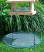 24 Seed Hoop trampoline-style platform feeder with a wooden frame, designed to catch spilled seed and deter unwanted critters, featuring adjustable hanging cords and a raised edge.