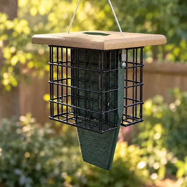 Angled view of Duncraft green recycled plastic double suet feeder with tan roof, black wire cages and built-in tail prop.