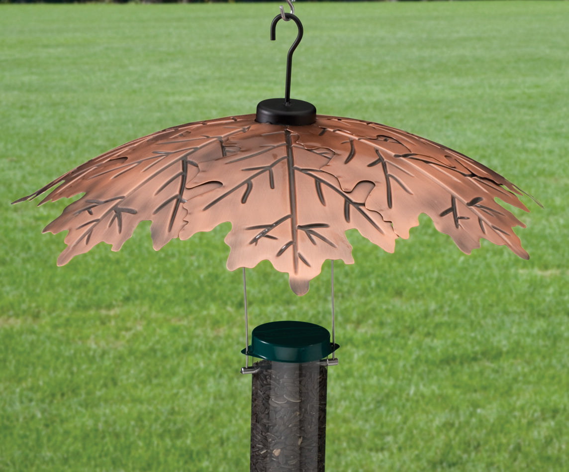 Copper Leaf Baffle: Decorative, chew-proof metal with oak leaf design, 18-inch diameter, protects bird feeders from squirrels and weather.