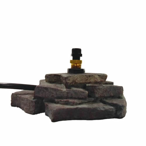 Avian Mister Rock Base on a stone, delivers a fine mist, connects to outdoor faucet, includes tubing and valve for easy setup.