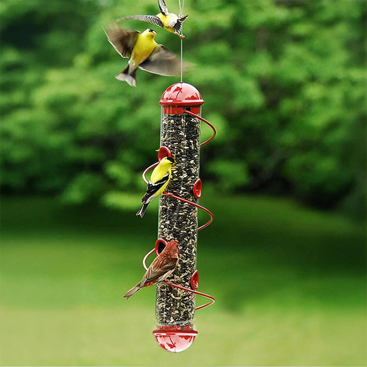 Red Spiral Sunflower Seed Feeder with spiral perch, showcasing finches feeding from eight ports. Includes hanging cable for convenience, made of aluminum and stainless steel.