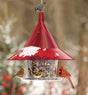 Arundale Ruby Sky Cafe bird feeder with a red bird perched, featuring a large seed tray and a 24-inch hanging chain.