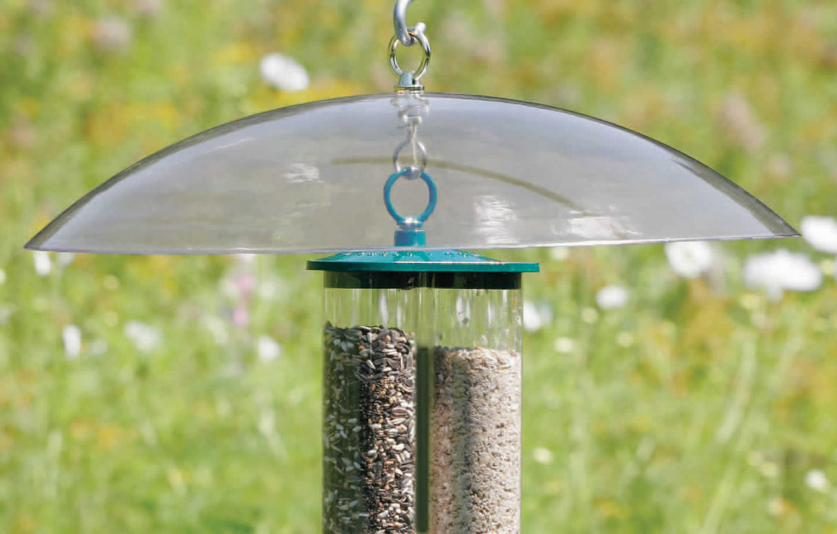 20 Clear Squirrel Baffle, featuring a hanging design, protects bird feeders from squirrels with a wide, tilting baffle filled with seeds.