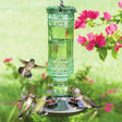 Antique Hummingbird Feeder with vintage-style green glass, featuring four red and green flower feeding ports and a no-drip design.