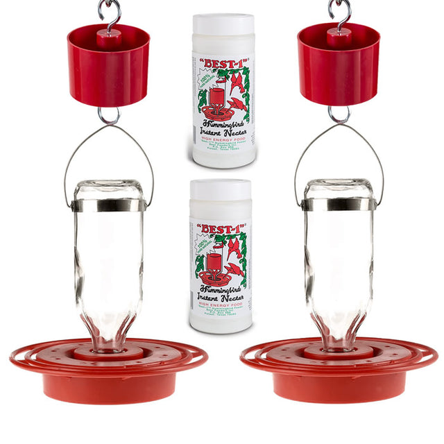 Close-up of the Best-1 Hummingbird Feeder in an 8 oz. dual kit, showcasing the clear glass reservoir and red plastic base.