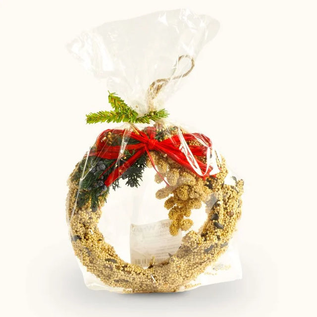 Mr. Bird Rustic Wreath: A 6-inch grapevine circle adorned with millet, juniper berries, red raffia bow, and cardinal accent, wrapped in cellophane with a hanging loop.