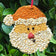 Holiday Bird Seed Cookie, Santa: Santa-shaped bird feeder with seed-covered wooden face, red raffia hanger. Features millet beard, strawberry nose, blueberry eyes, and raisin mouth.