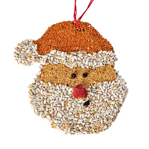 Holiday Bird Seed Cookie, Santa: A Santa-shaped bird feeder with red millet hat, sunflower kernel trim and beard, yellow millet face, berry nose, raisin eyes, and mouth.