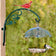 Heavy Duty Vine Hanger with decorative green metal bracket, supports a clear plastic umbrella over seed tray. Cardinal and Chickadee enjoy the feeder below.