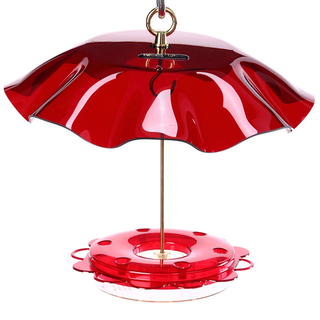 Hummerfest Feeder with Swirl Weather Guard, featuring a red bird feeder with a protective umbrella, metal pole, six feeding stations, and built-in ant moat.