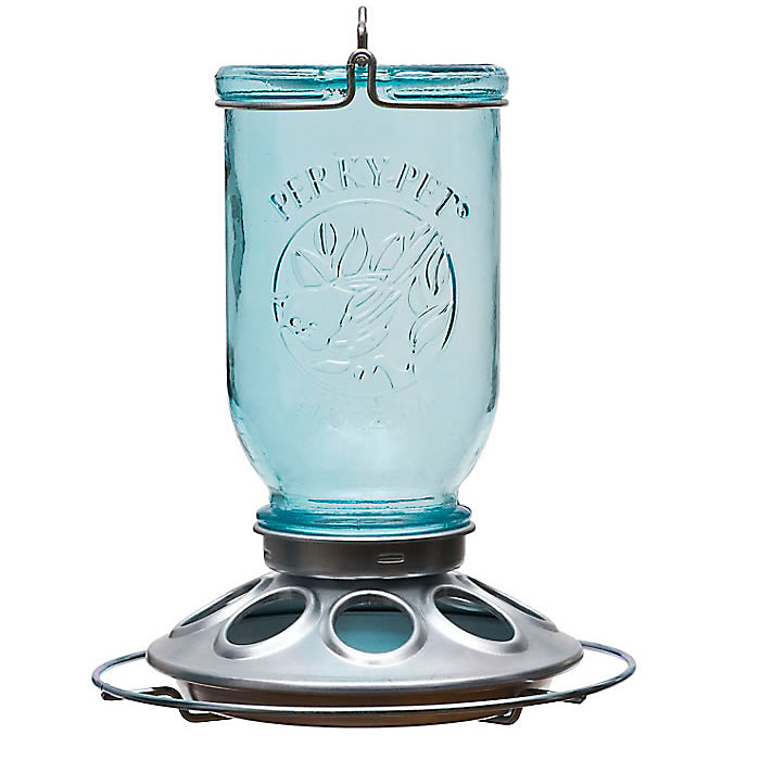 Mason Jar Wild Bird Feeder with a silver base and 8 feeding ports, featuring a vintage-style blue glass container and easy-to-clean design.