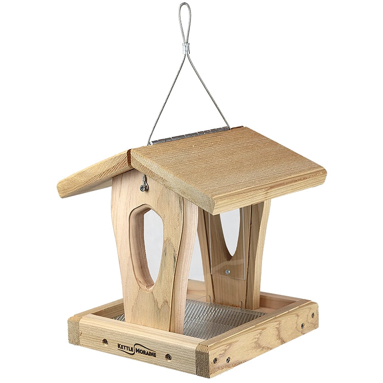 Compact cedar hopper bird feeder featuring screened tray, clear seed panels, and hanging cable.