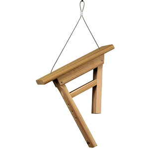 Side view of a cedar tail-prop bird feeder designed for woodpeckers and clinging birds.