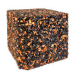 Sizzling Premium Hot Pepper Jumbo Seed Block, a compressed mix of black oil sunflower seeds, peanuts, and grains, designed to attract birds while deterring squirrels.