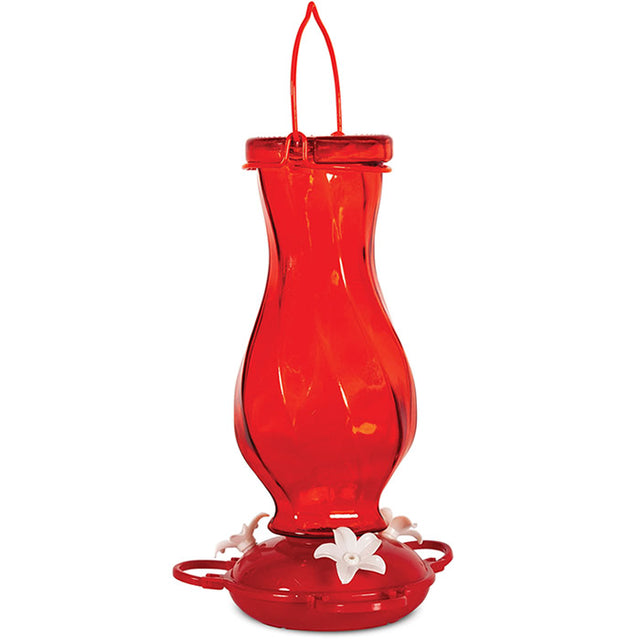 Red Twist Glass Bottle Hummingbird Feeder with white flower feeding ports, red plastic base, and three feeding stations, featuring a translucent glass reservoir for easy nectar level viewing.