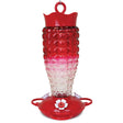 Textured Glass Hummingbird Feeder with a red fade, white flower feeding ports, and a red plastic base, featuring three feeding stations and an ant moat.