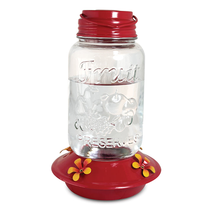 Mason Jar Glass Hummingbird Feeder with red lid, clear glass body, and metal flower feeding ports. Holds 30 oz. with 4 feeding ports.