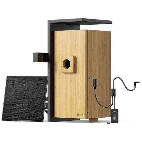 Wooden birdhouse with black stand and accessories on a white background