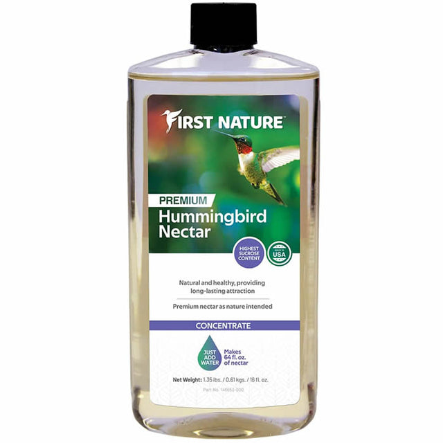 First Nature Clear Hummingbird Nectar Concentrate, 16 oz bottle, with a close-up of the label showing a flying hummingbird.