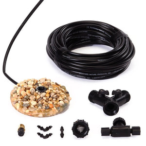 Avian Mister Pebble Rock Base with round mister, black cable, and tubing for birdbaths. Includes regulator valve, faucet fitting, and Y valve for easy setup.